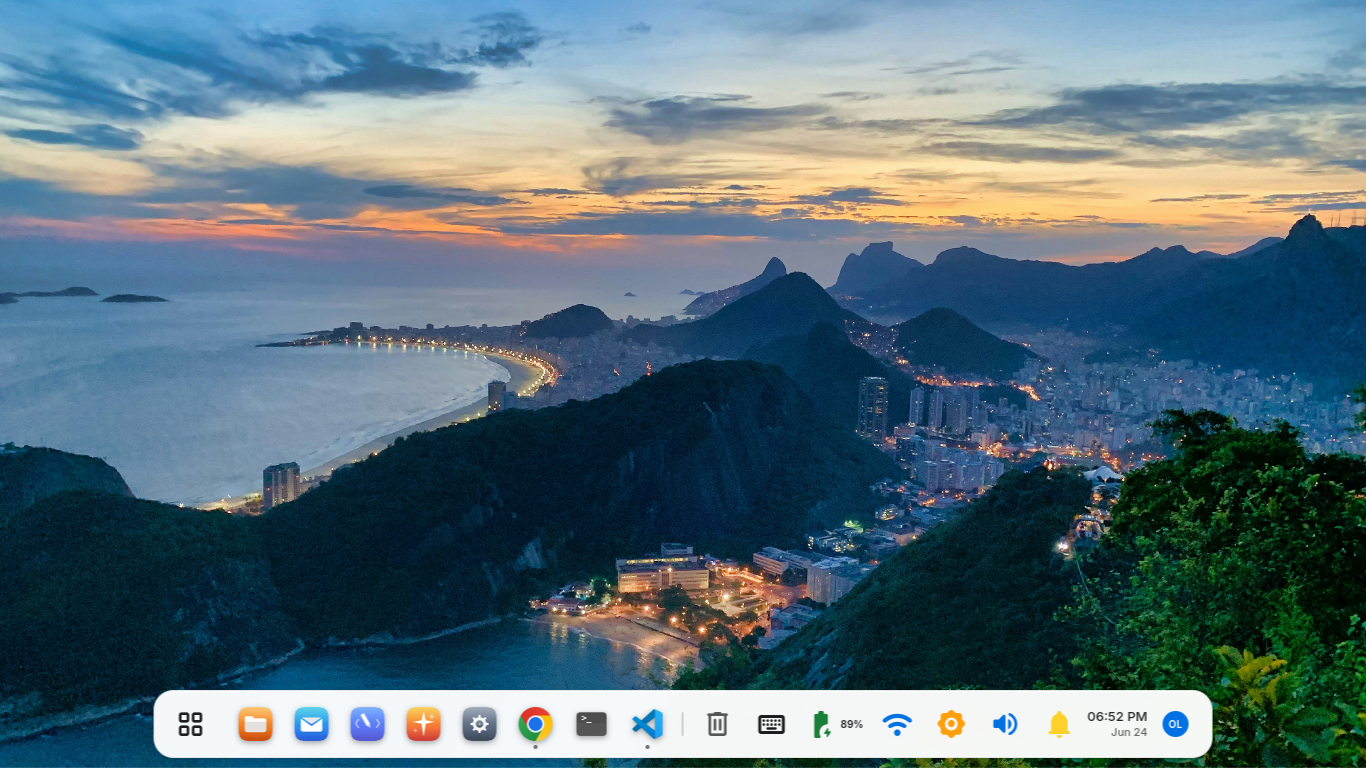 Ollie Desktop wallpaper with the dock and system status